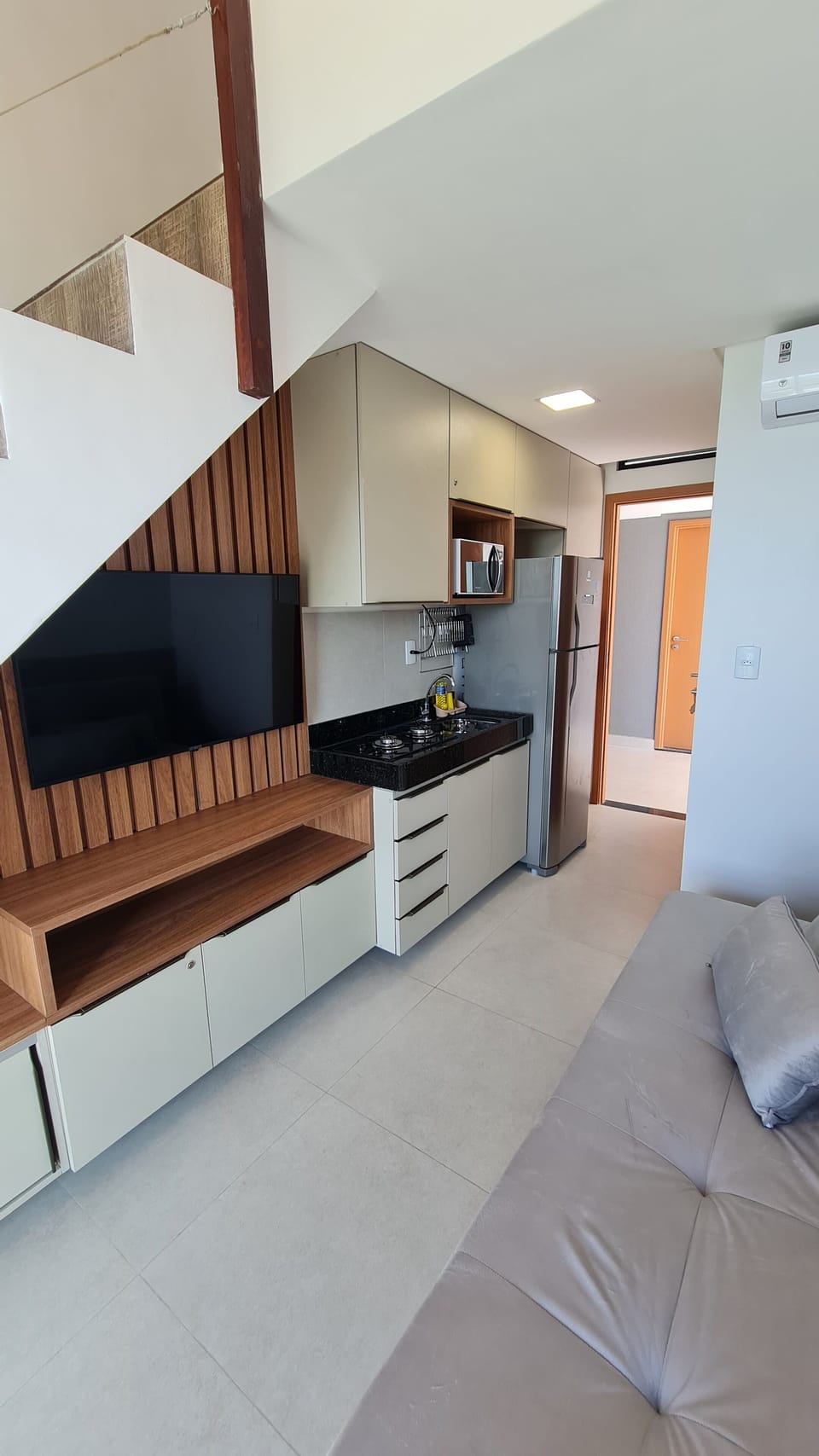 Comfort Duplex, Lagoon View | Living area | Flat-screen TV