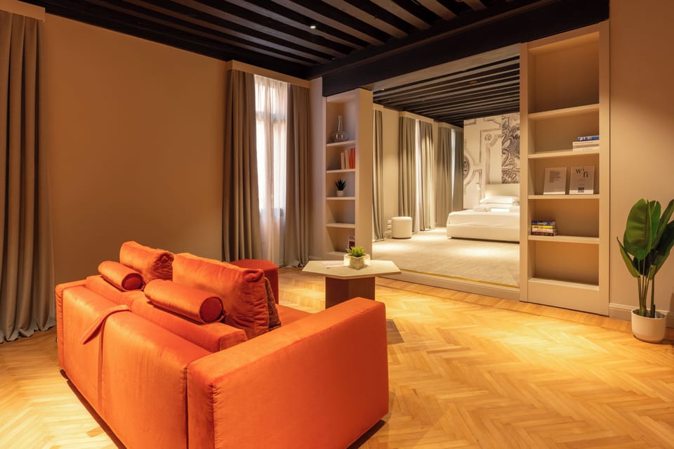 Luxury Apartment | Living area | 30-inch TV with digital channels