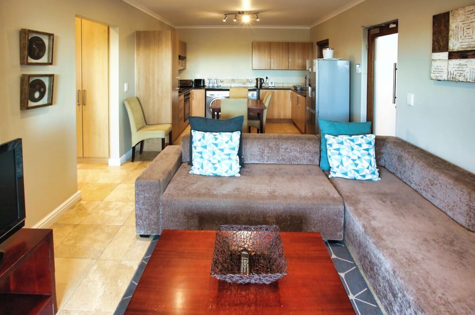 Comfort Apartment, Garden View | Living area | Flat-screen TV, fireplace