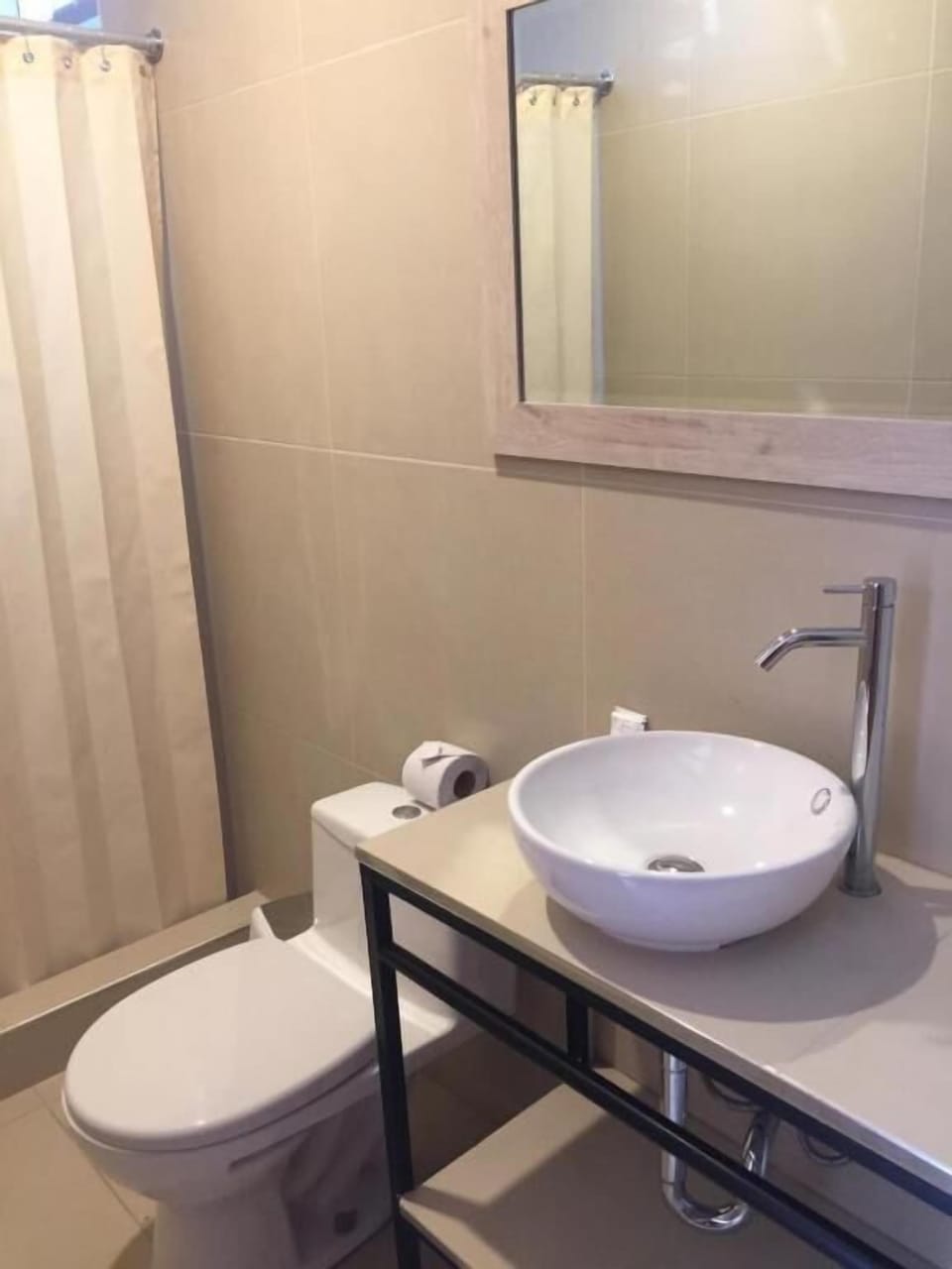 Shower, rainfall showerhead, towels, soap