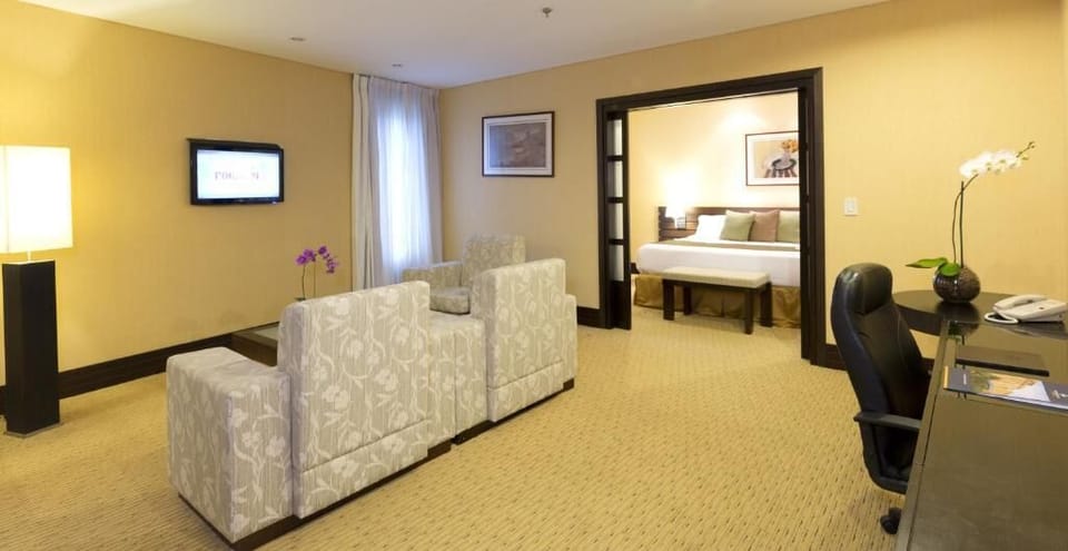 Hypo-allergenic bedding available, down comforters, in-room safe, desk