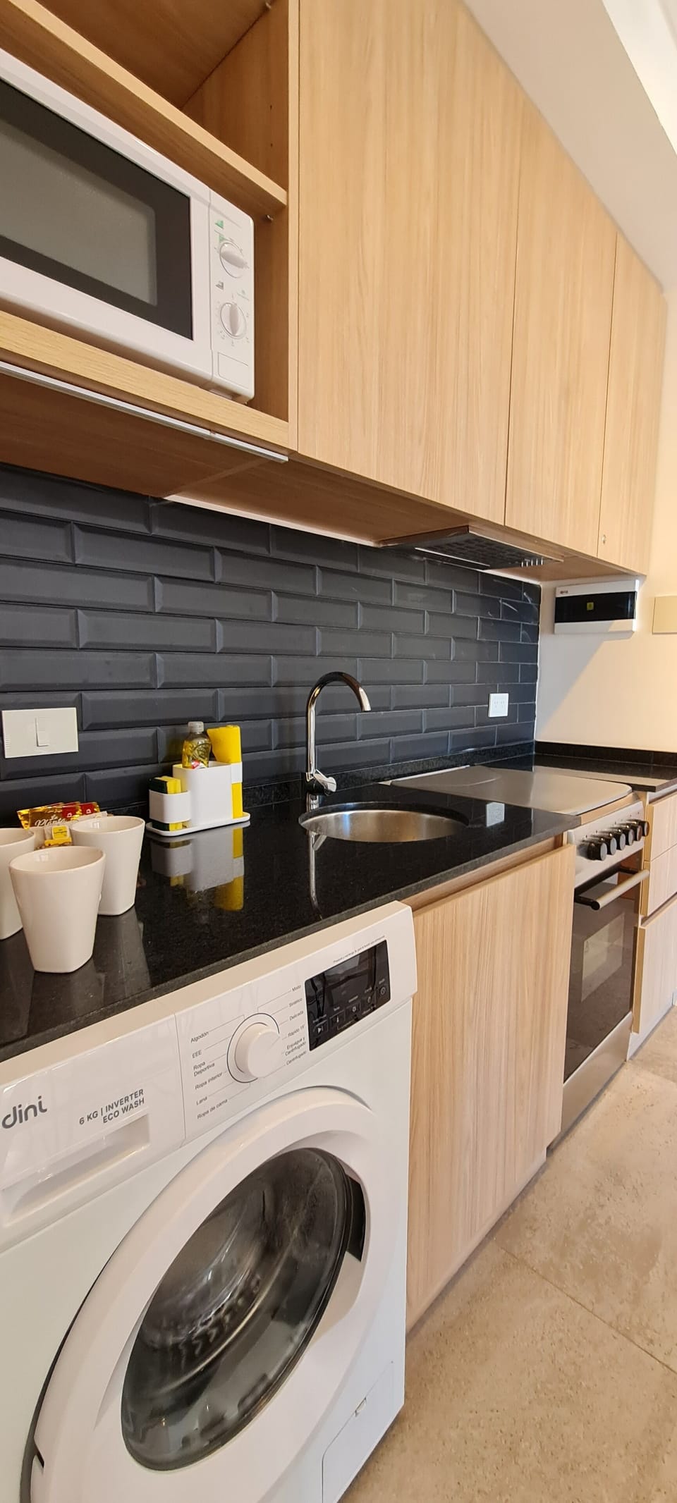 Mini-fridge, microwave, oven, stovetop
