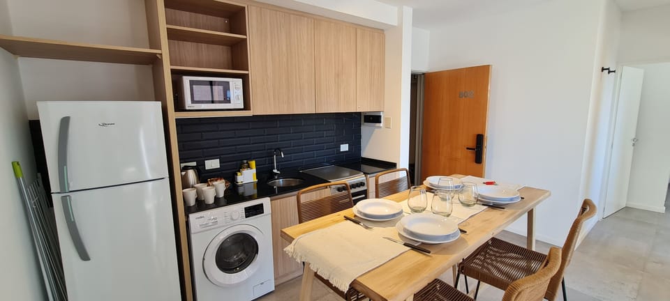 Mini-fridge, microwave, oven, stovetop