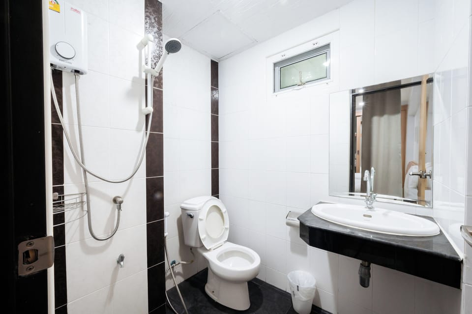 Economy Double Room | Bathroom | Shower, free toiletries, towels, soap