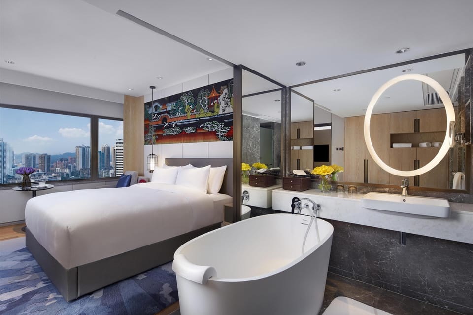 Separate tub and shower, rainfall showerhead, hair dryer, bathrobes