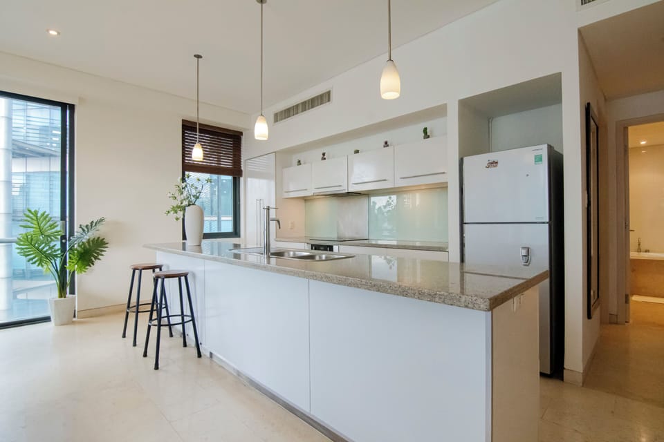 Family Suite, 2 Bedrooms, Balcony, City View | Private kitchen | Fridge, microwave, oven, stovetop
