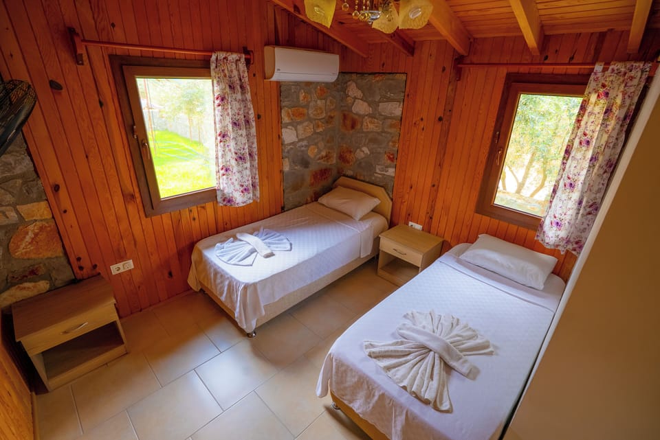 Traditional Cabin, 2 Bedrooms, Terrace, Garden View | Iron/ironing board (on request), individually decorated