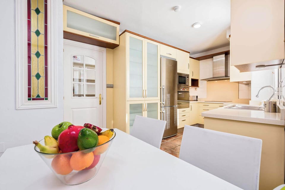 Family Apartment, City View | Private kitchen | Full-size fridge, microwave, oven, stovetop