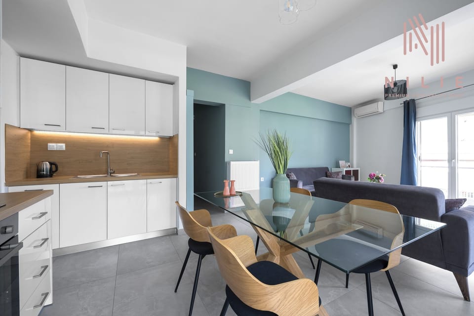 Family Apartment, Balcony, City View | Living area | Flat-screen TV