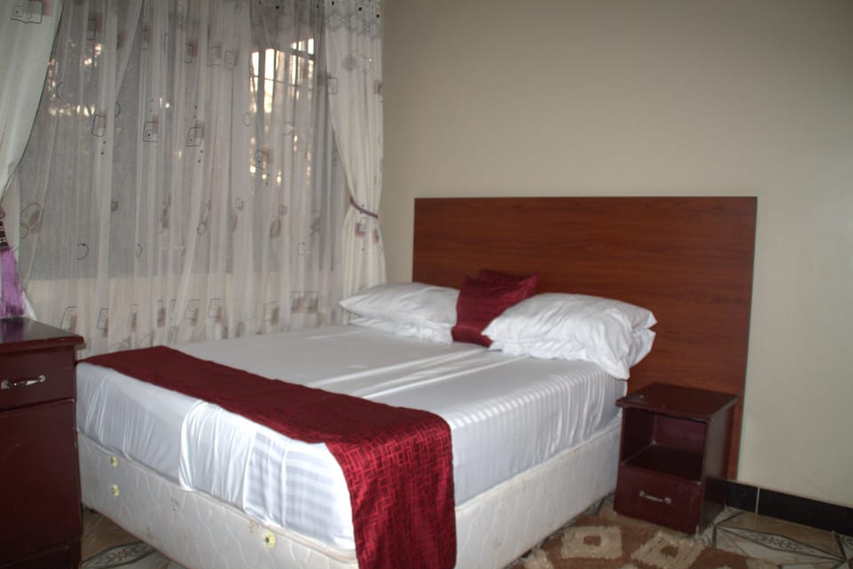 Desk, laptop workspace, free WiFi, bed sheets