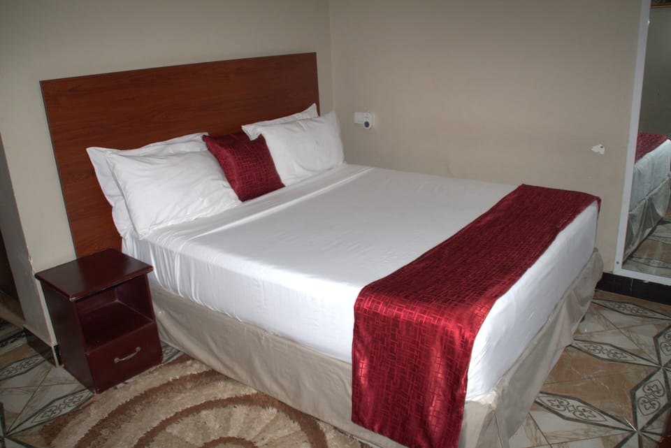 Desk, laptop workspace, free WiFi, bed sheets