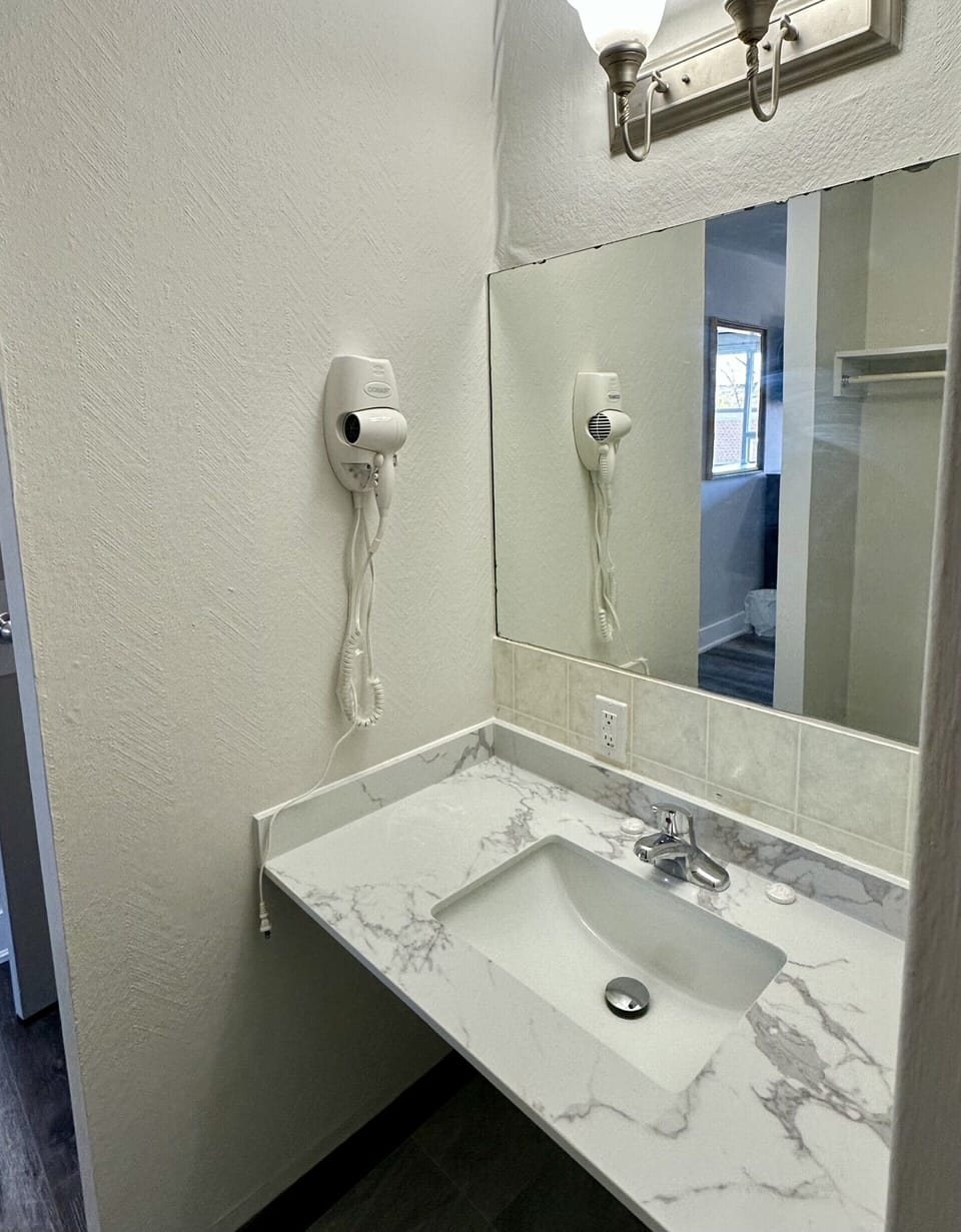 Hair dryer, towels, soap, shampoo
