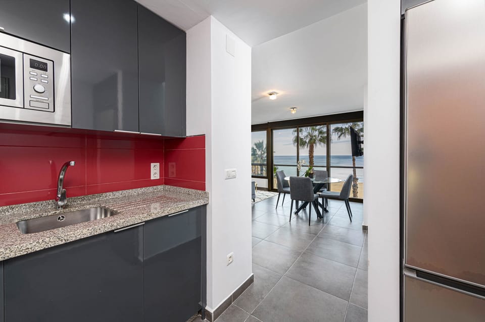 Luxury Apartment, Sea View | Private kitchen | Full-size fridge, microwave, oven, stovetop