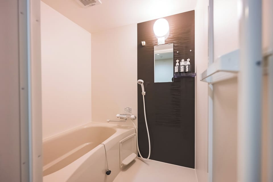 Separate tub and shower, free toiletries, hair dryer, bathrobes