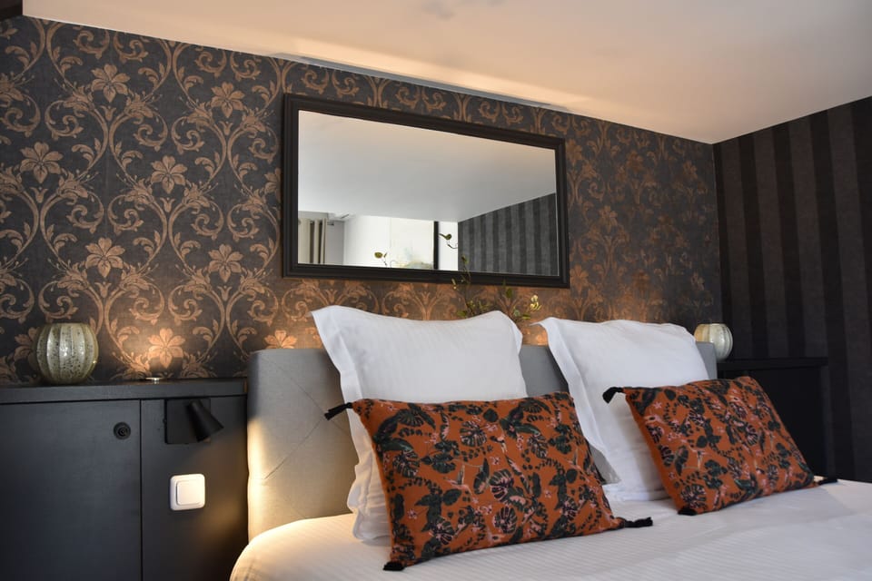 Superior Suite, Private Bathroom (Marie) | Blackout drapes, soundproofing, iron/ironing board, free WiFi