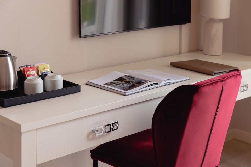 Exclusive Double Room, City View | Minibar, in-room safe, desk, laptop workspace