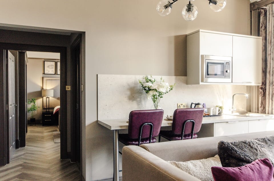 Deluxe Studio Suite, Non Smoking, Ground Floor | Living area | 50-inch Smart TV with digital channels