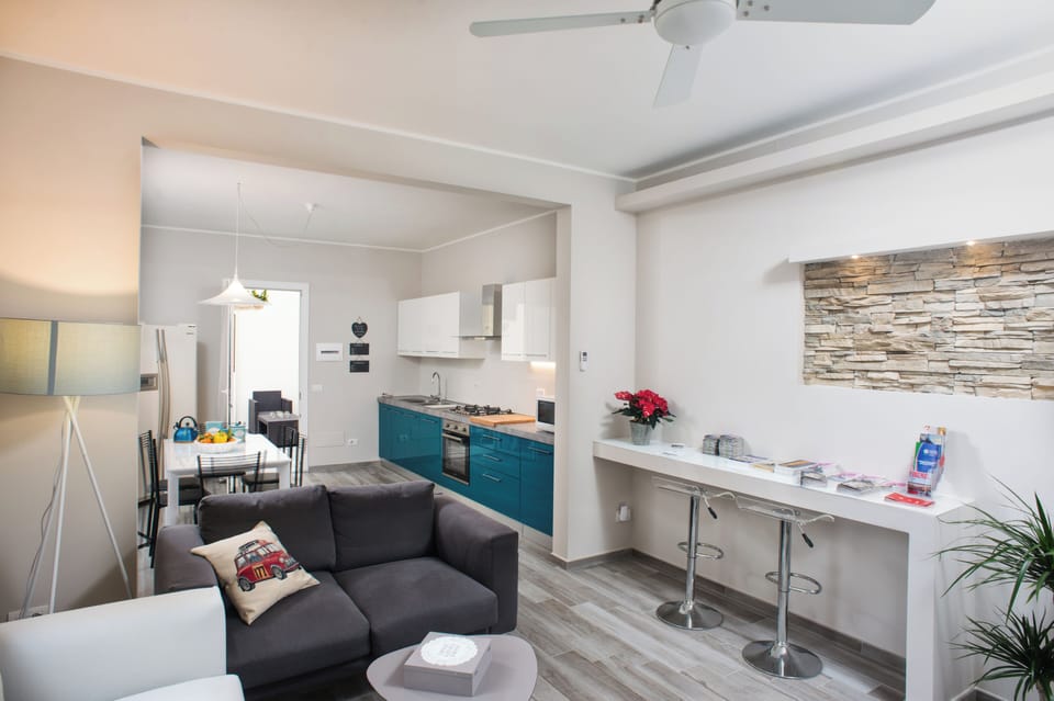 Apartment | Living area | 24-inch flat-screen TV with digital channels