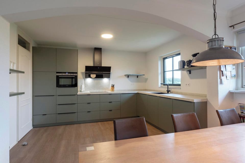 Villa | Private kitchen | Stovetop, electric kettle, toaster, highchair