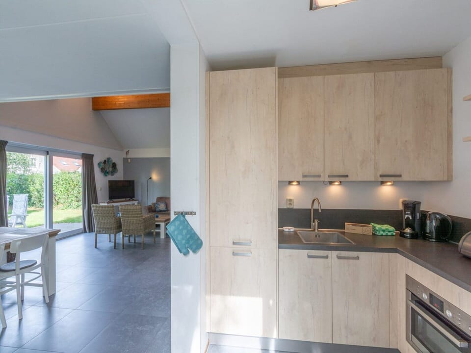 Villa | Private kitchen | Stovetop, electric kettle, toaster, highchair