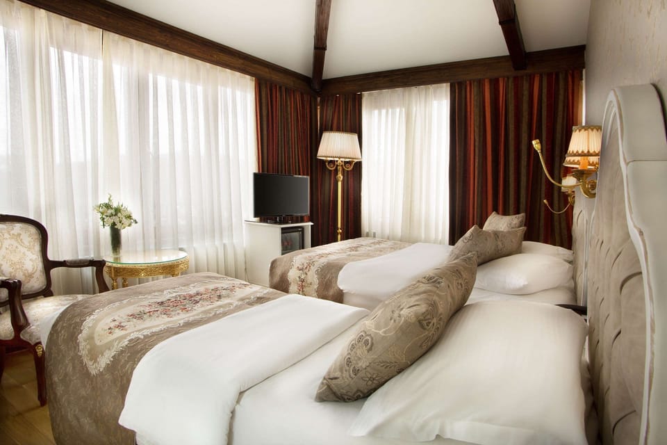 Standard Room, Multiple Beds, Non Smoking | Premium bedding, down comforters, Tempur-Pedic beds, minibar