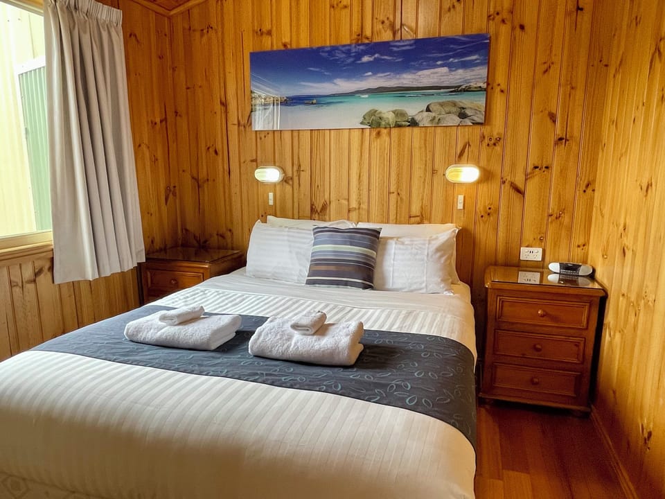 Deluxe Cabin, 1 Bedroom, Balcony, Garden Area | Premium bedding, individually furnished, blackout drapes, soundproofing