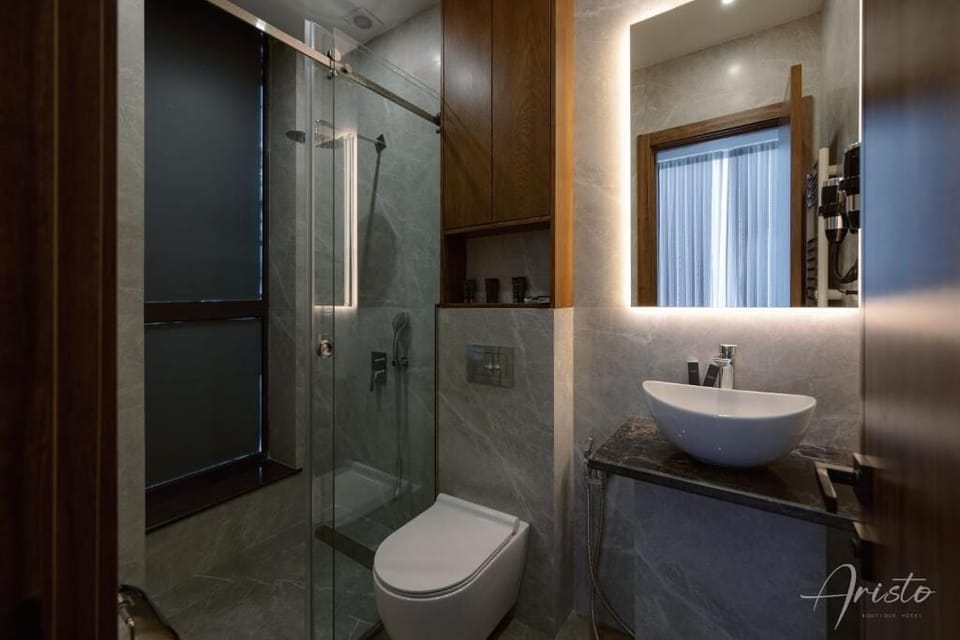 Separate tub and shower, free toiletries, hair dryer, slippers