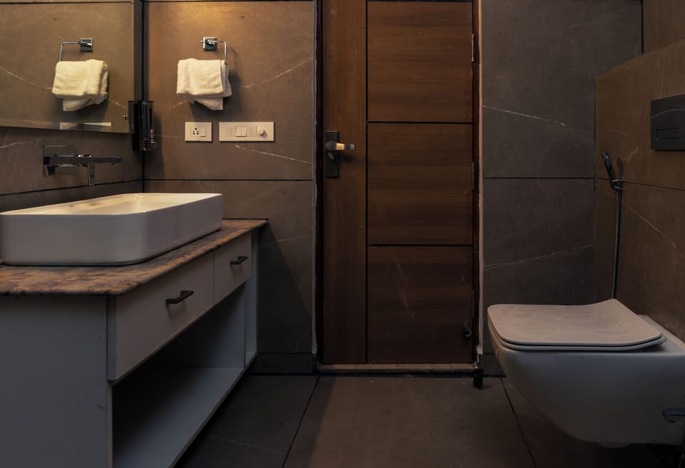 Shower, slippers, bidet, towels