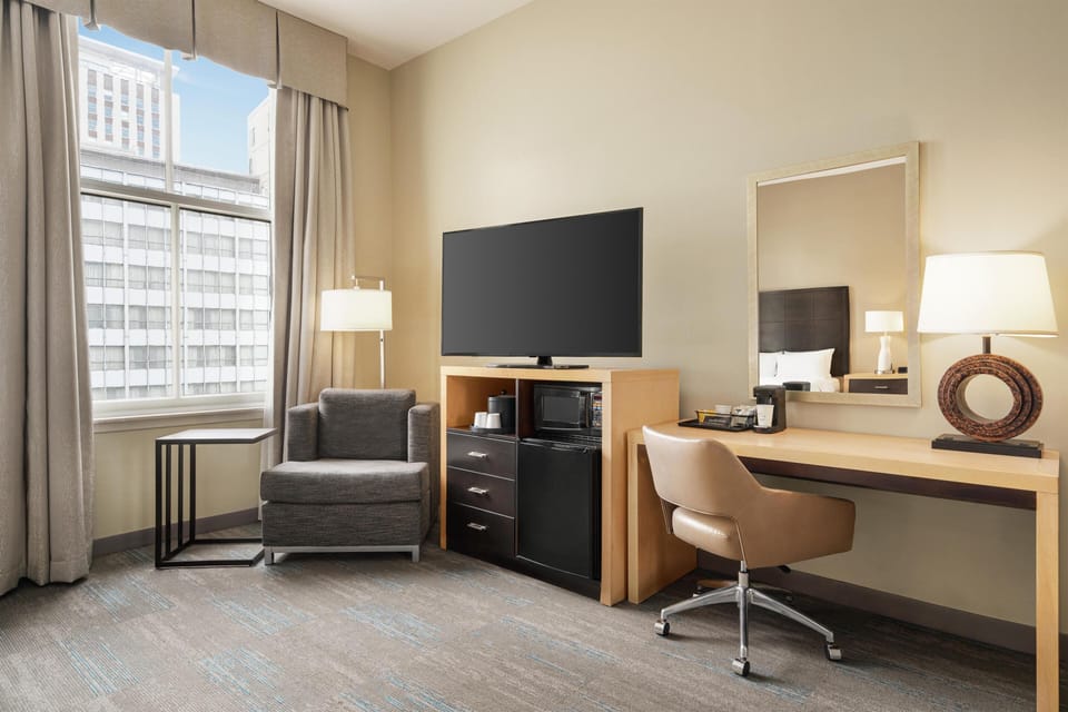 Two queen beds | In-room safe, desk, laptop workspace, iron/ironing board