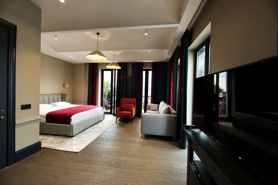 Junior Double Room, Balcony, Sea View | In-room safe, desk, iron/ironing board, free WiFi