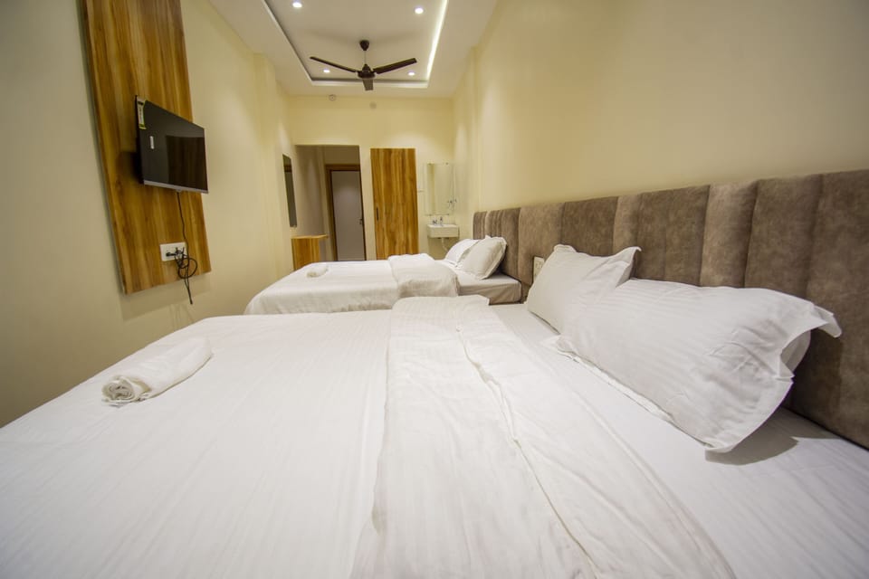 Deluxe Quadruple Room | WiFi (free), bed sheets