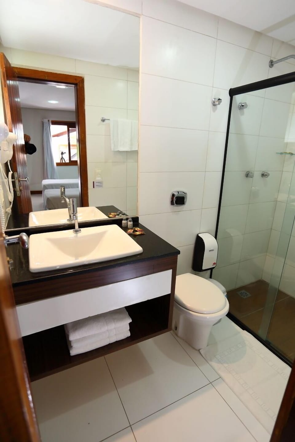 Shower, towels, toilet paper