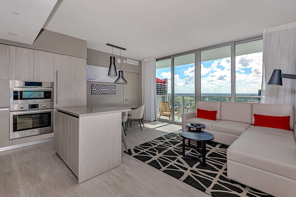 Luxury Apartment, 3 Bedrooms, Balcony, City View | Living area | 50-inch Smart TV with cable channels