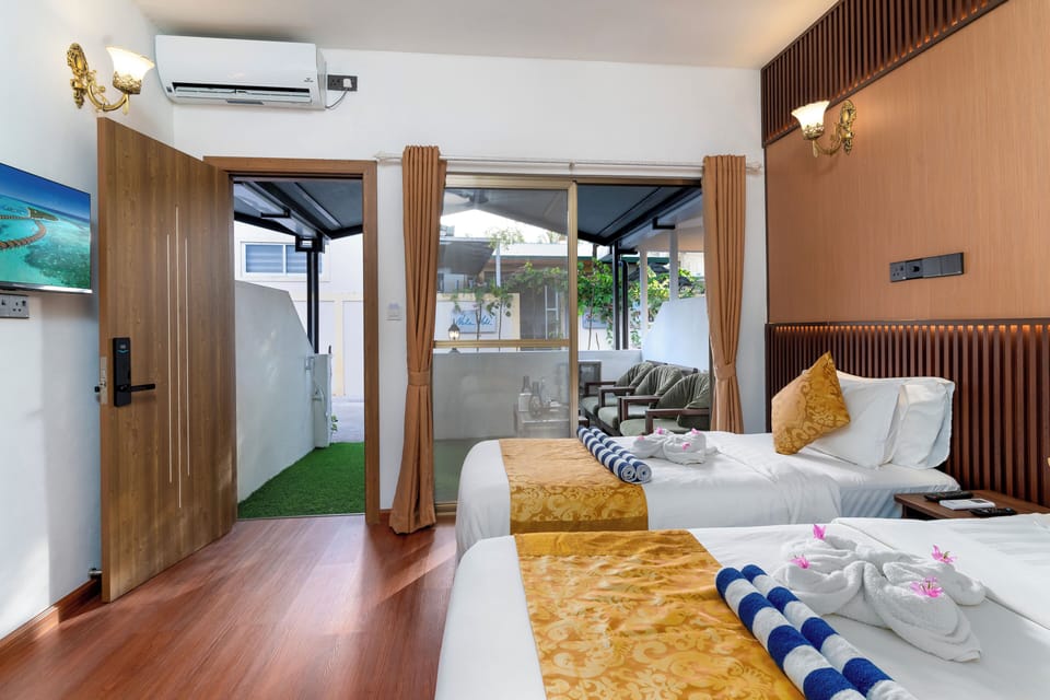 Superior Suite, Patio | 1 bedroom, in-room safe, iron/ironing board, free WiFi