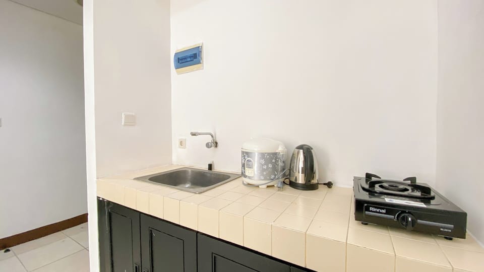 Apartment | Private kitchen | Fridge, stovetop, rice cooker, dining tables