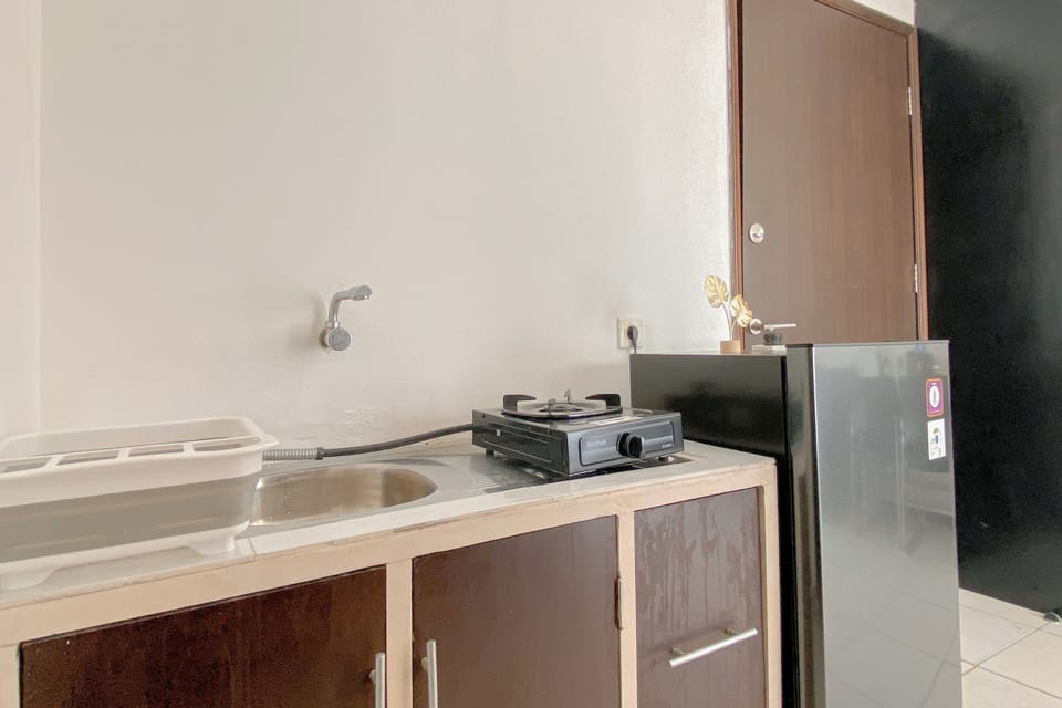 Apartment | Private kitchen | Fridge, stovetop, rice cooker, dining tables