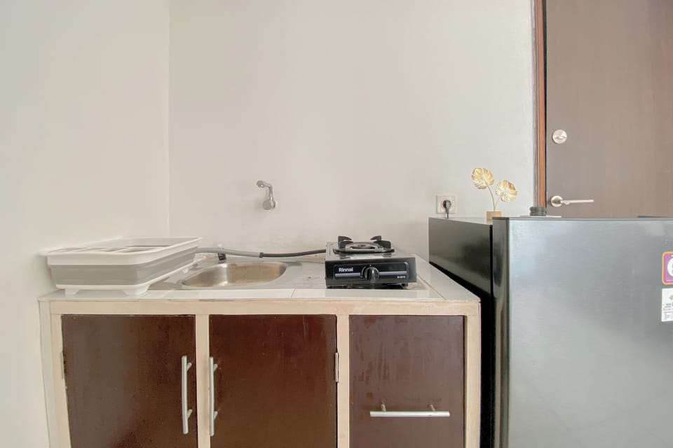 Apartment | Private kitchen | Fridge, stovetop, rice cooker, dining tables