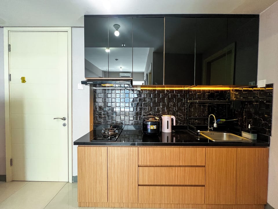 Apartment | Private kitchen | Fridge, stovetop, rice cooker, dining tables