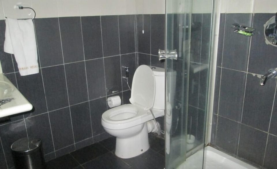 Basic Room, Balcony, City View | Bathroom | Free toiletries, hair dryer, towels, soap