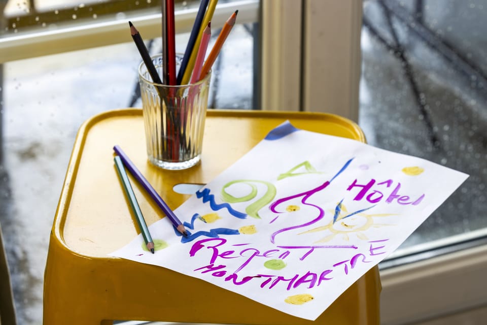Desk, blackout drapes, iron/ironing board, travel crib