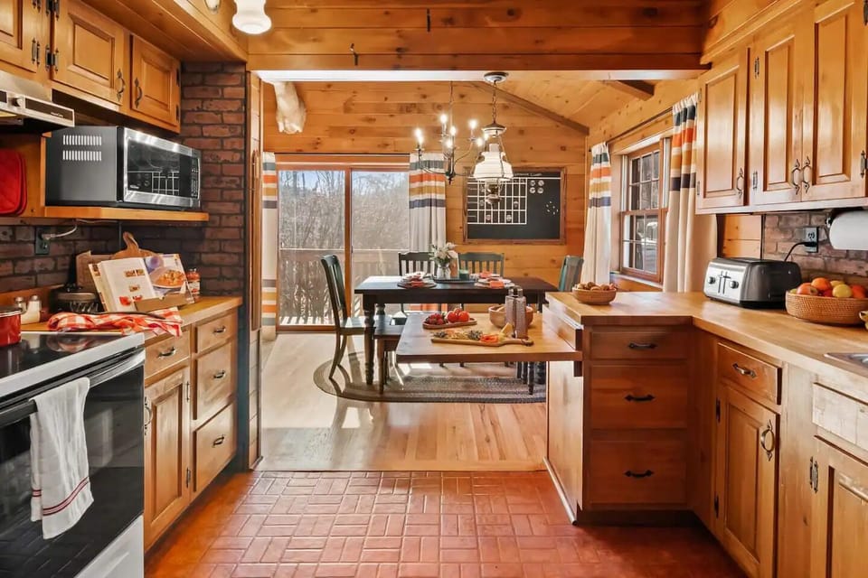 Luxury Cabin, River View | Private kitchen | Coffee/tea maker, full-size fridge, microwave, oven