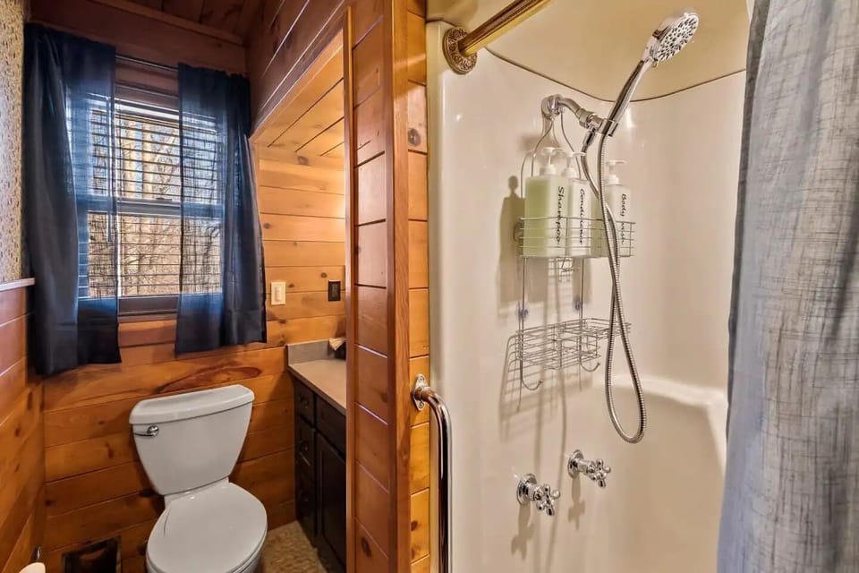 Luxury Cabin, River View | Bathroom | Combined shower/tub, hair dryer, towels, soap