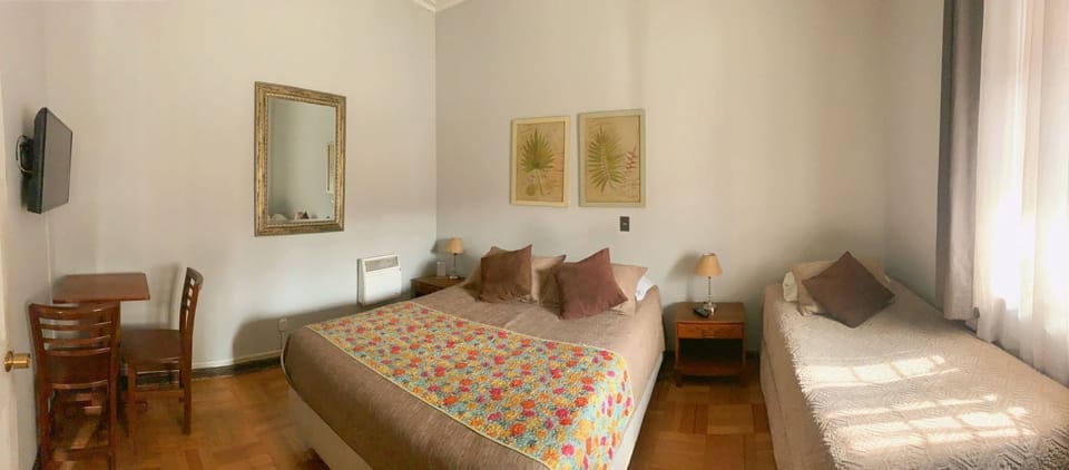 Classic Quadruple Room, Shared Bathroom, City View | Desk, laptop workspace, free WiFi