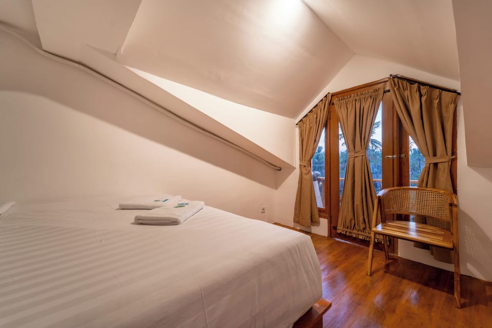 Apartment, Garden View | Premium bedding, pillowtop beds, in-room safe, blackout drapes