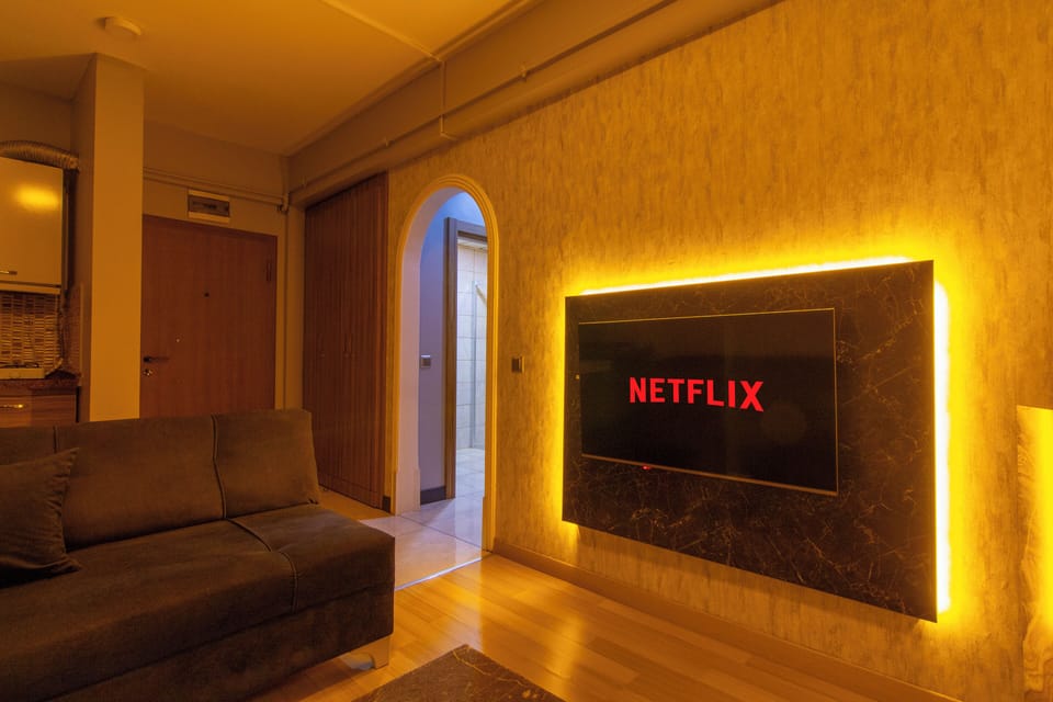 Standard Apartment | Living room | 43-inch Smart TV with digital channels, Netflix, streaming services