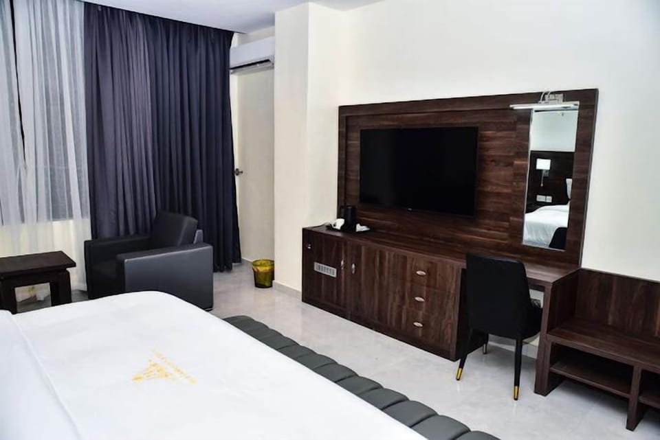 Comfort Room, Balcony, City View | Desk, laptop workspace, free WiFi
