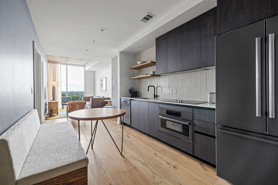Condo, 1 King Bed with Sofa bed, City View | Private kitchen | Full-size fridge, microwave, oven, stovetop