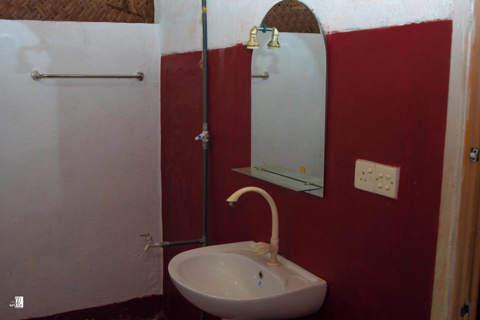 Shower, free toiletries, slippers, towels