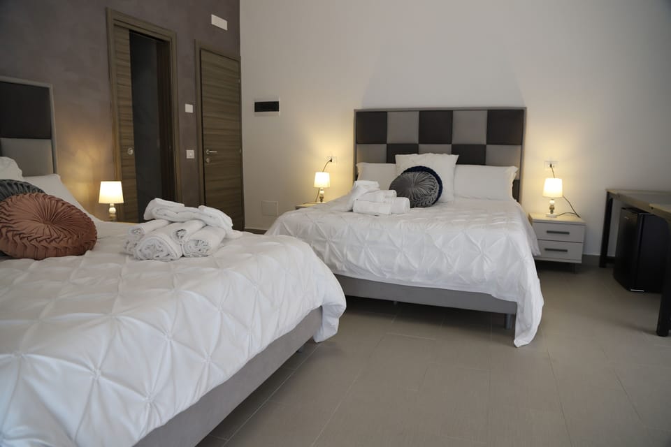 Emerella Luxury Family Suite Room 6 | Premium bedding, down comforters, individually decorated