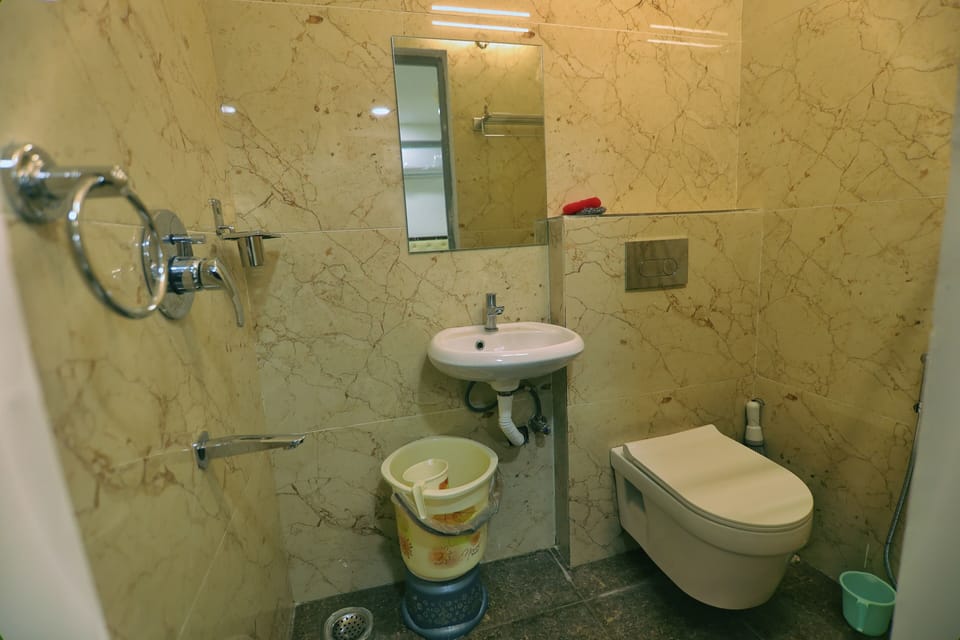 Shower, rainfall showerhead, towels, soap